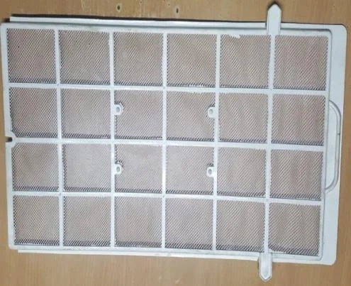 Home appliance moulded filter panel