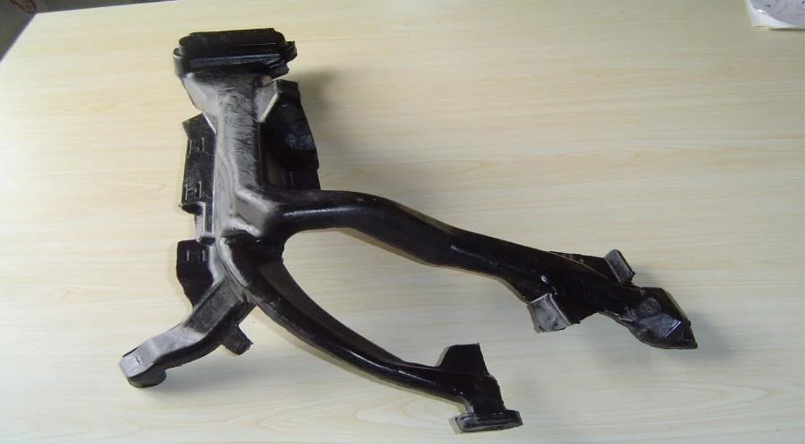Moulded automotive structural part