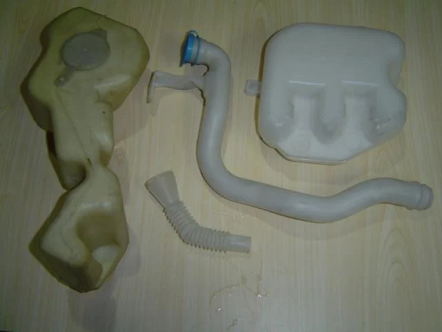 Blow moulded tank and hose set